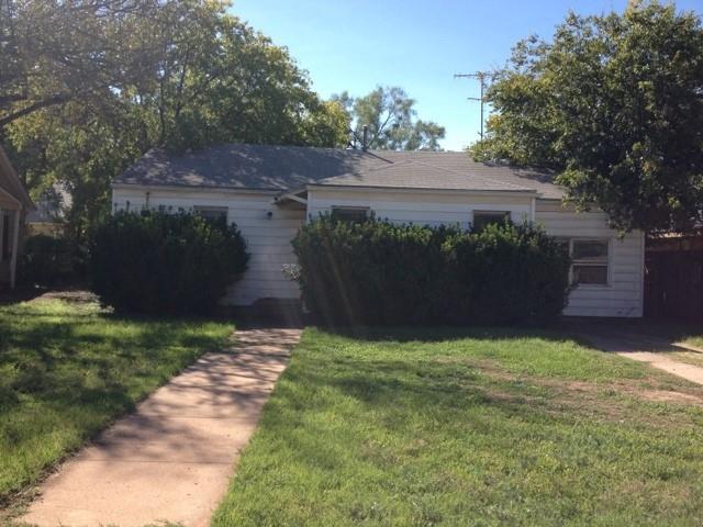 a view of a house with a garden