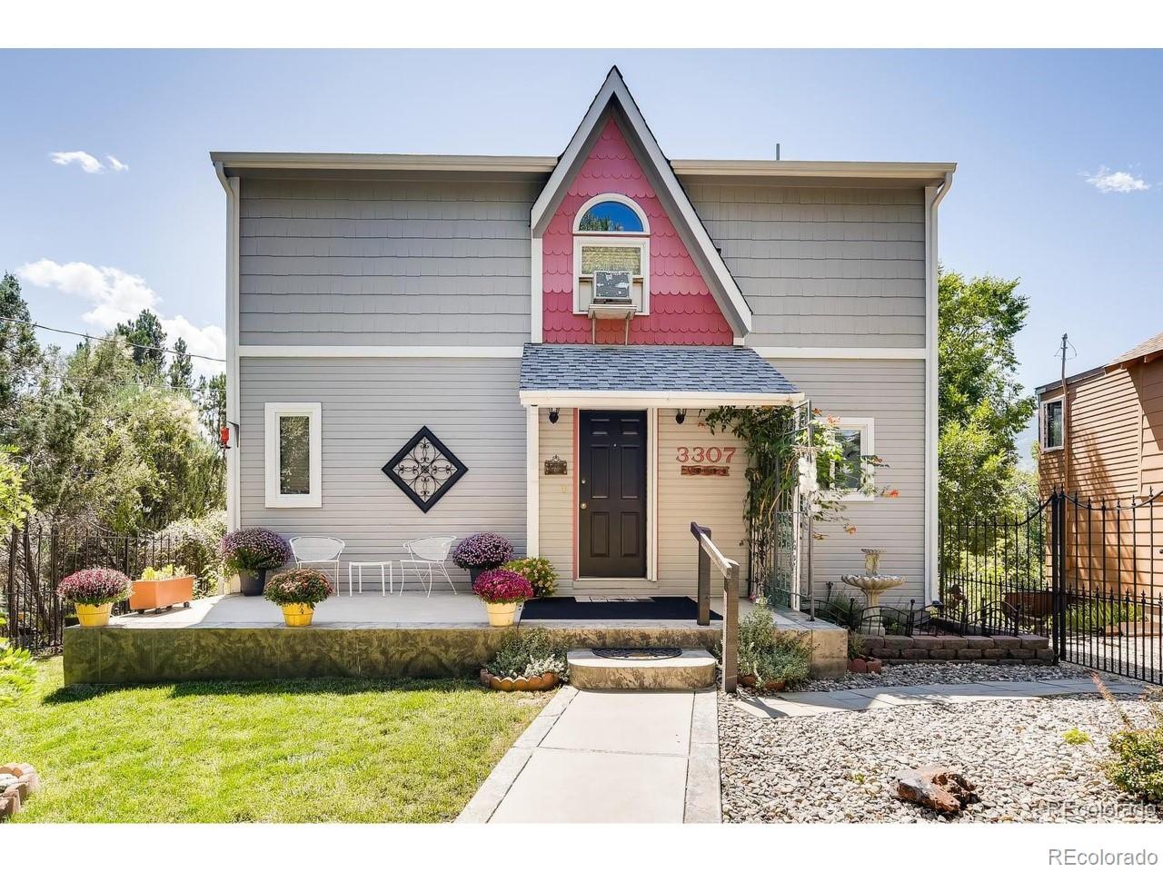 a front view of house with yard outdoor seating and entertaining space