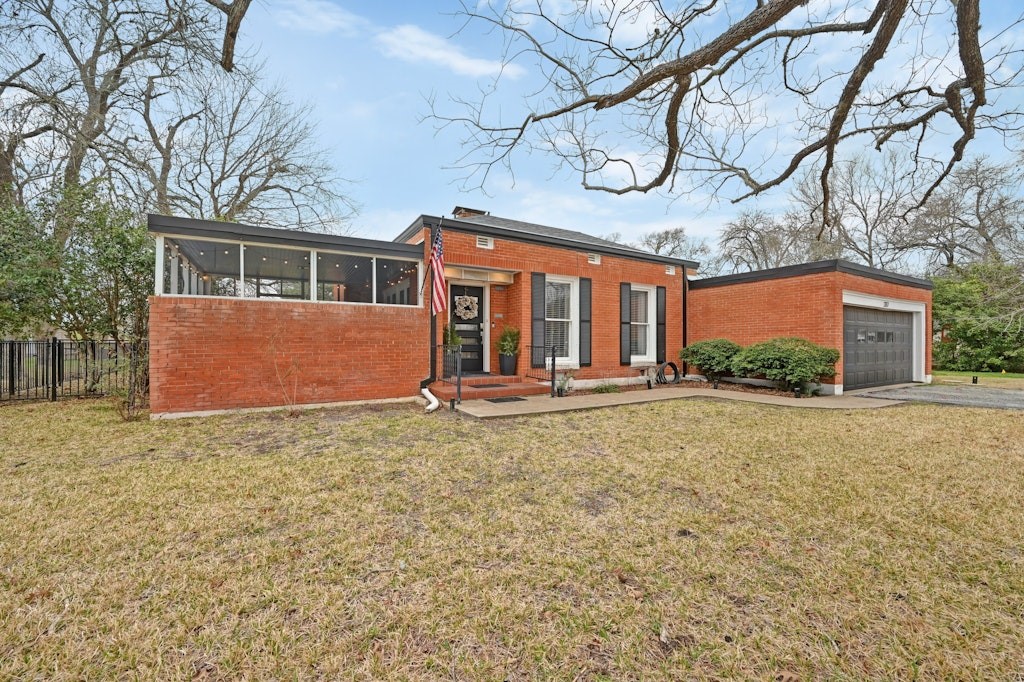 front view of house with a yard