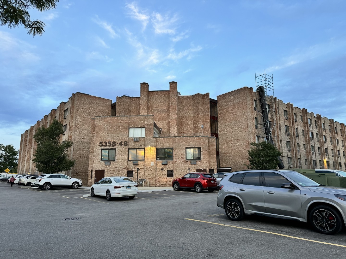 a view of a cars parked in front of a building