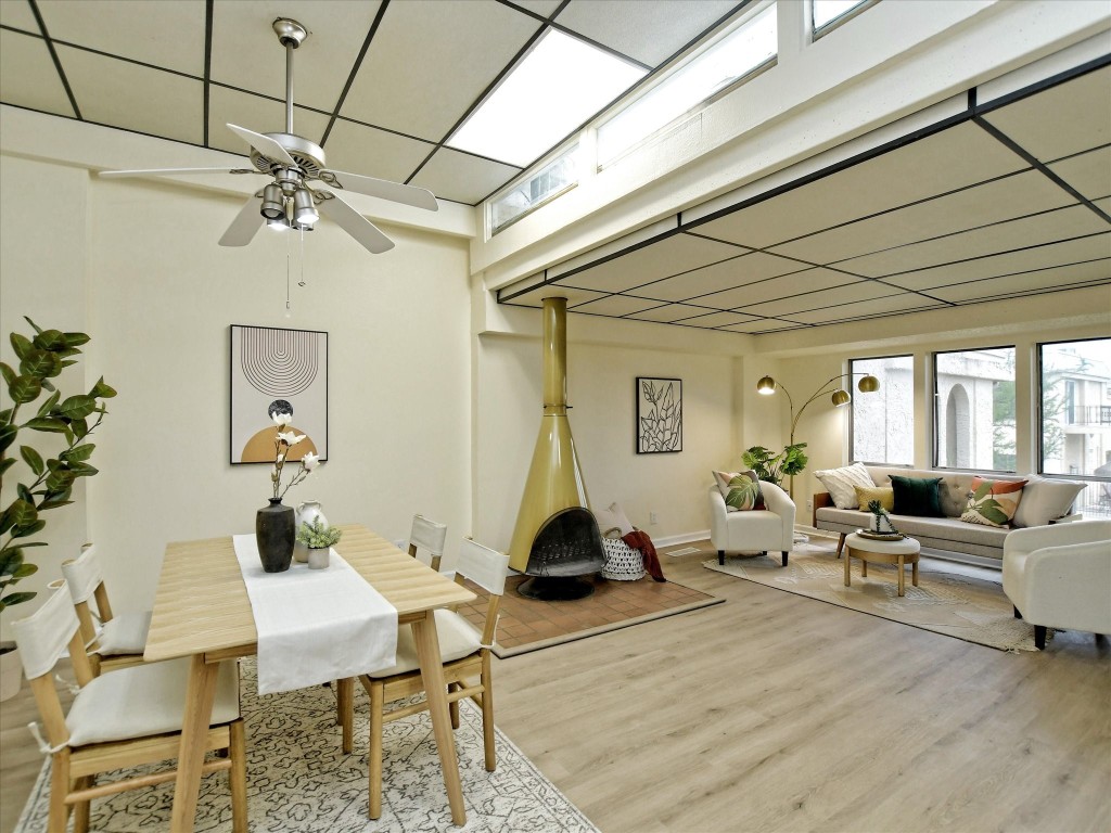 a living room with lots of furniture and a chandelier