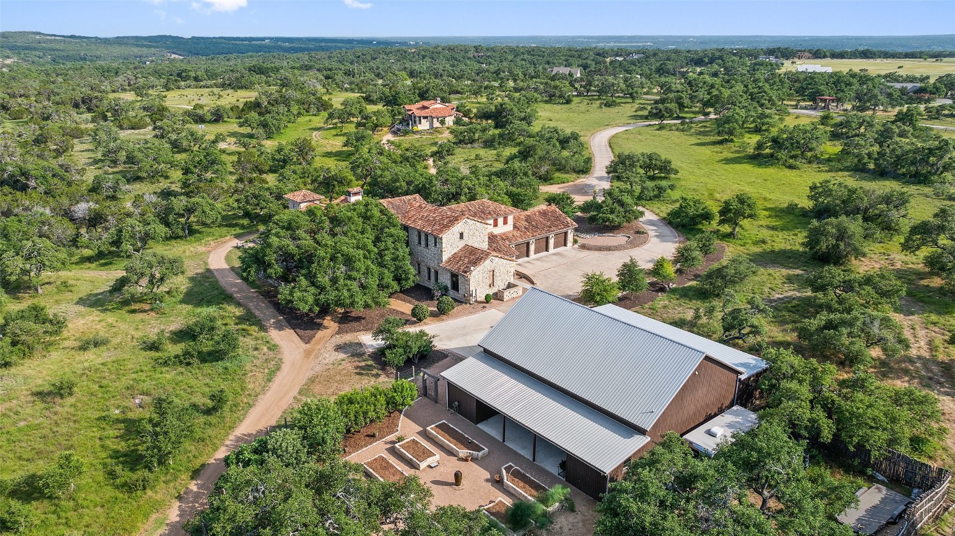 an aerial view of residential house with outdoor space