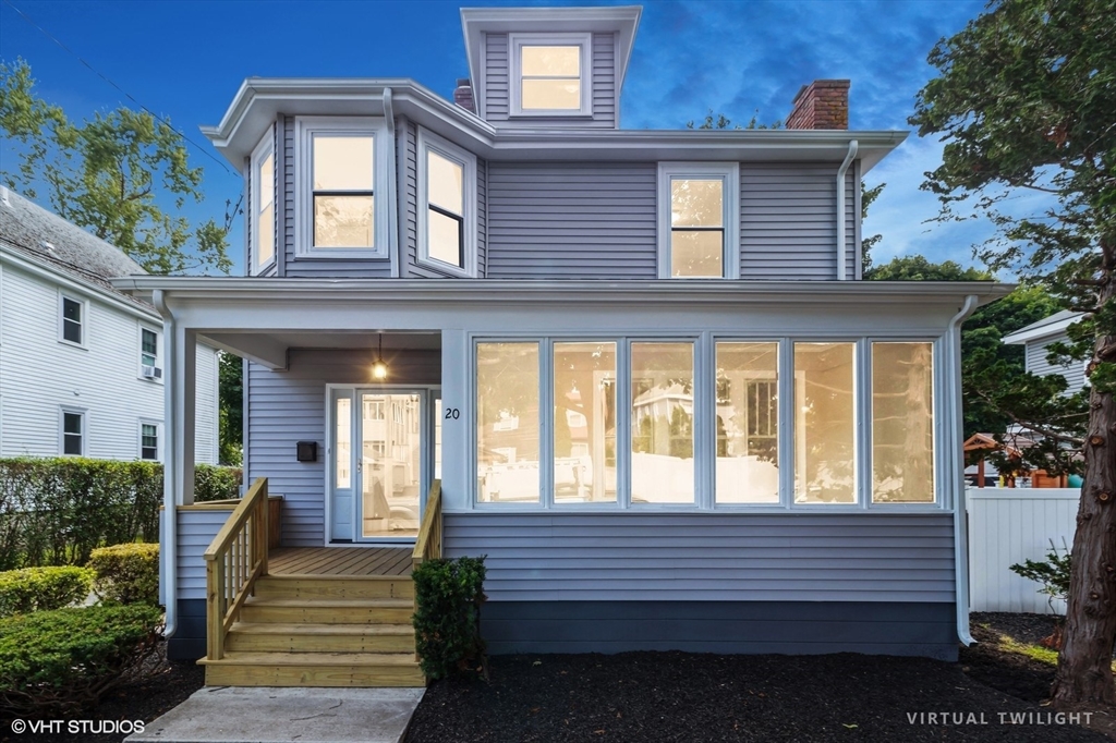 a front view of a house with a porch