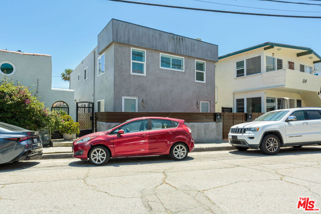 a car parked in front of a house