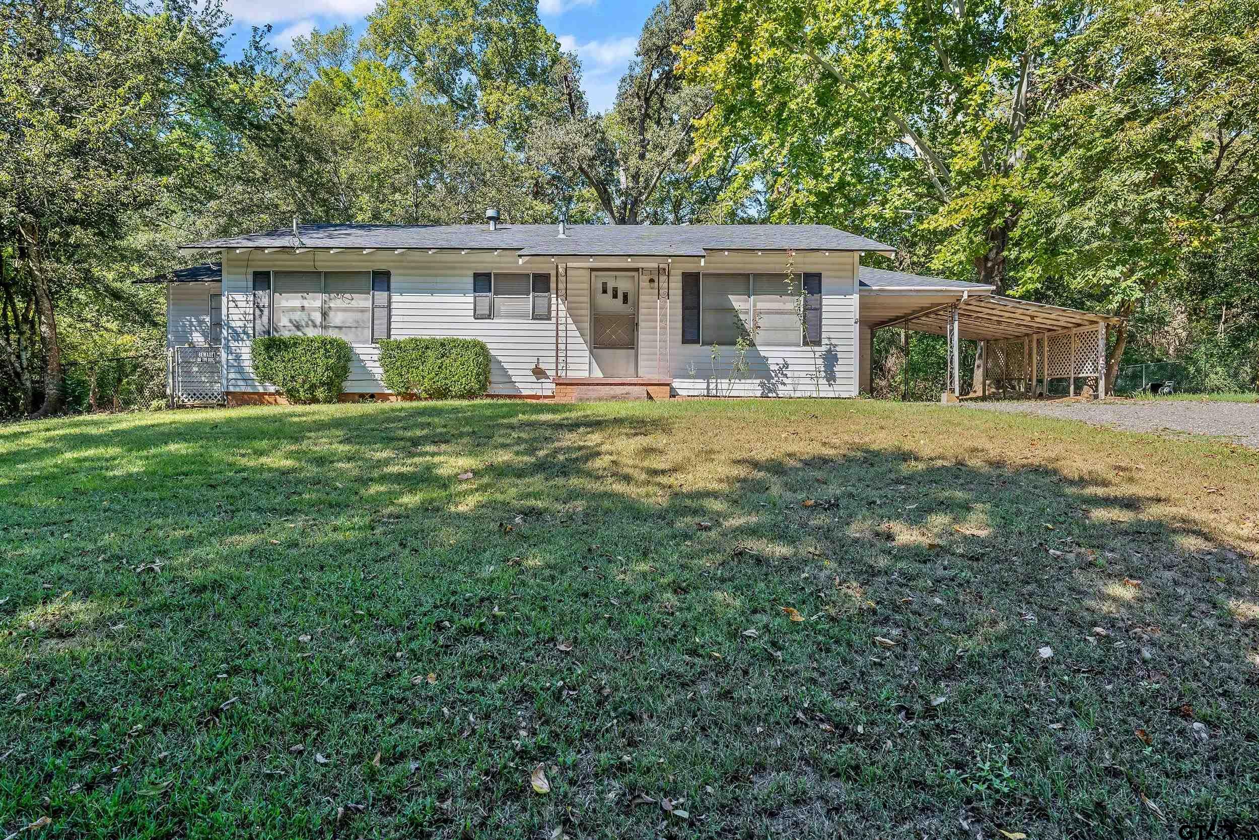 front view of a house and a yard