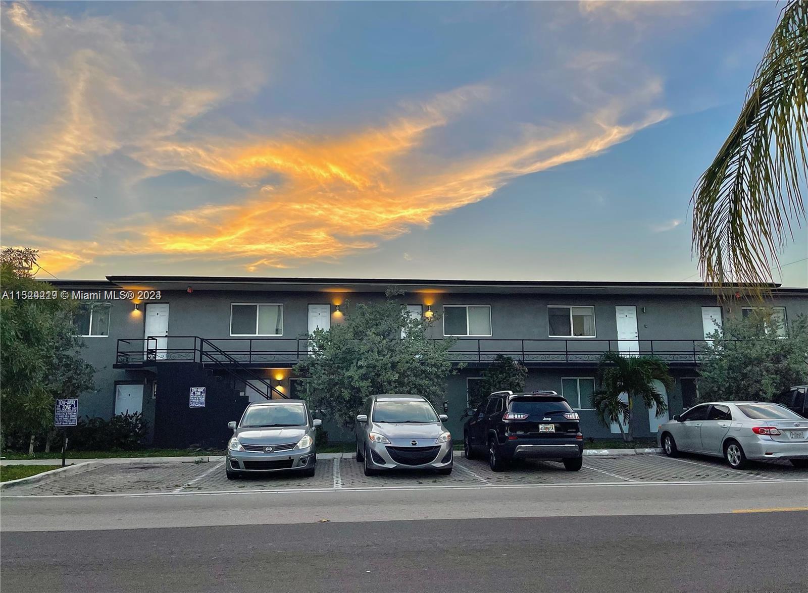 a car parked in front of a building