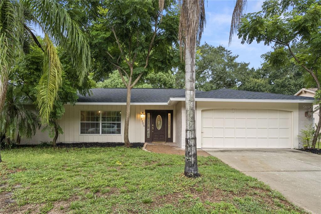 front view of a house with a yard