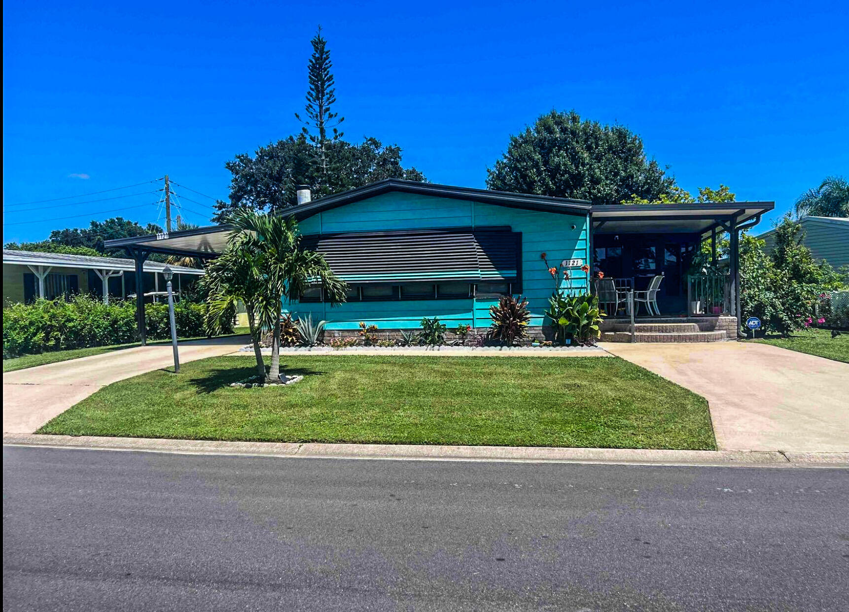 a front view of house with a yard