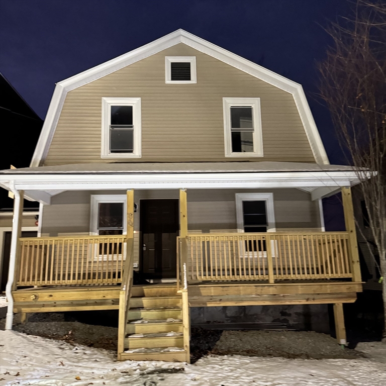 a view of a house with a deck