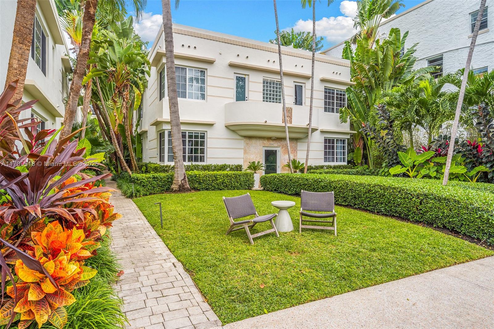 a swimming pool with outdoor seating and yard