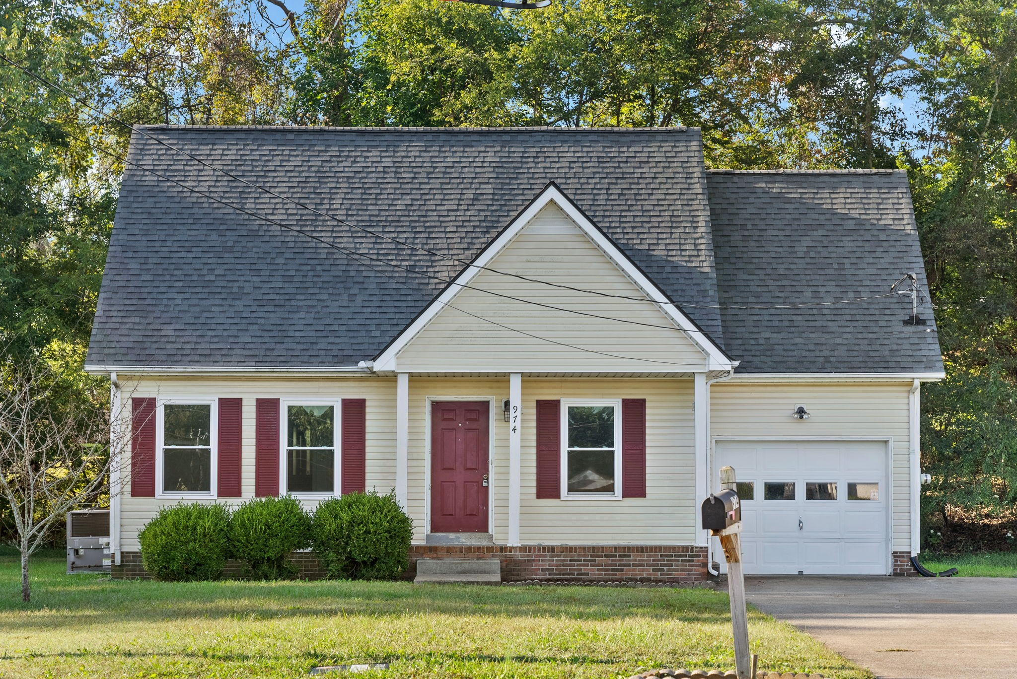 front view of a house with a yard