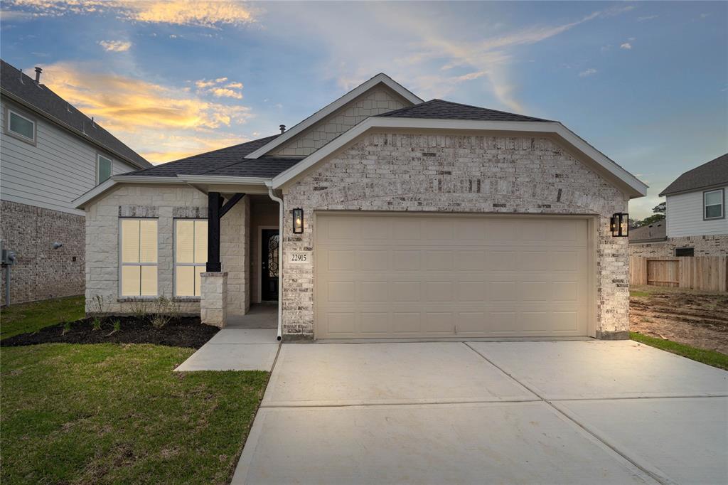 Welcome home to 22915 Lotus Pass Drive located in Breckenridge Park and zoned to Spring ISD.