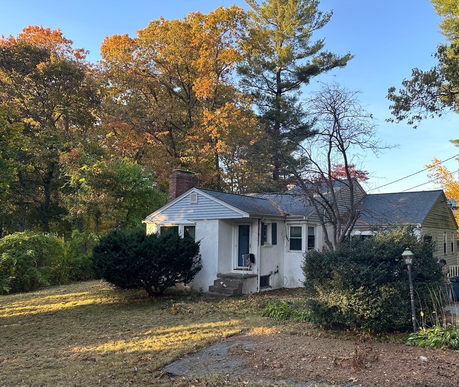 a view of a house with garden