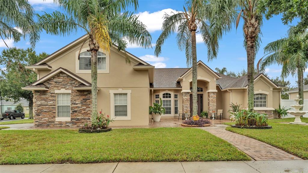 front view of a house with a yard