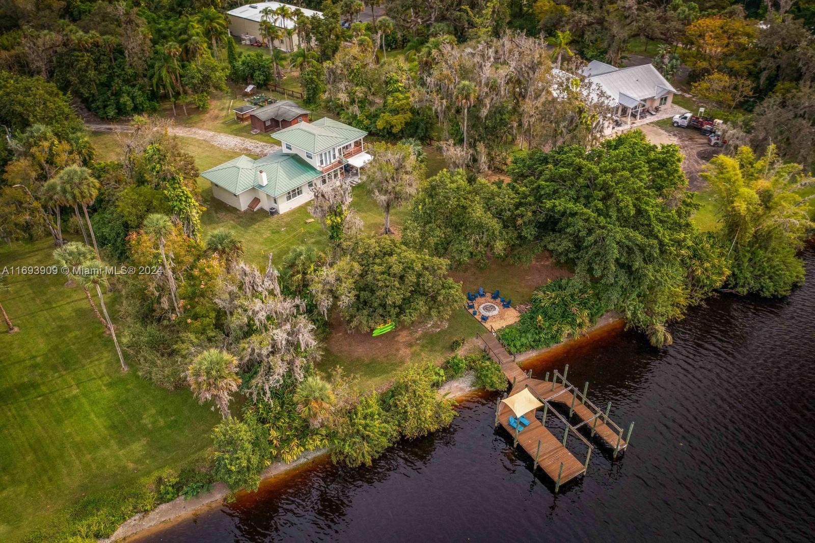 an aerial view of residential house with outdoor space