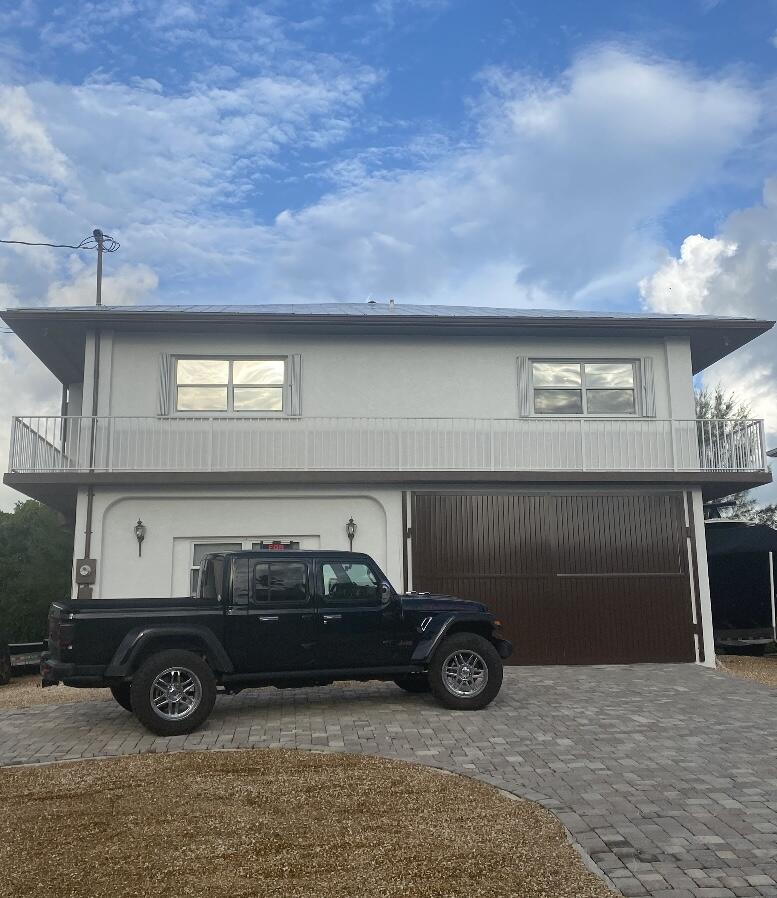 a car parked in front of a house