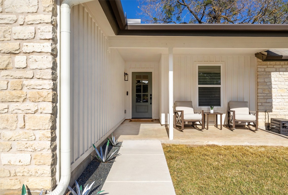 Cozy front patio to enjoy your morning coffee.