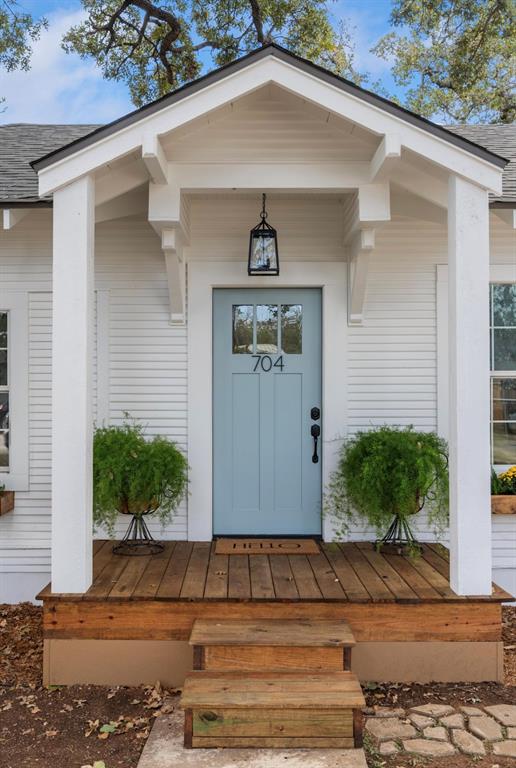 a front view of a house with garage