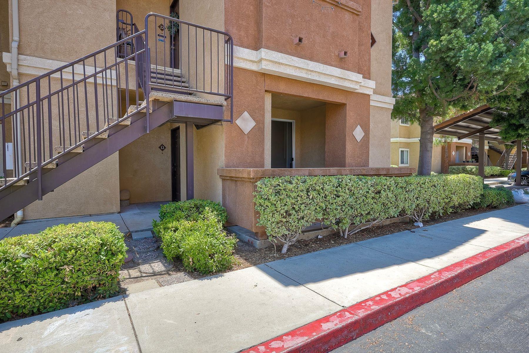 a view of a house with brick walls