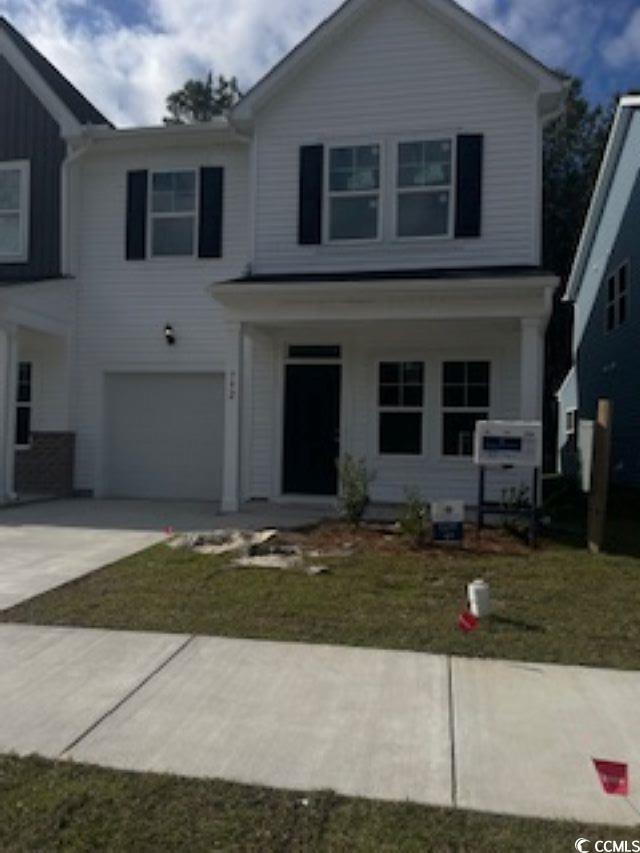 View of front facade with a garage