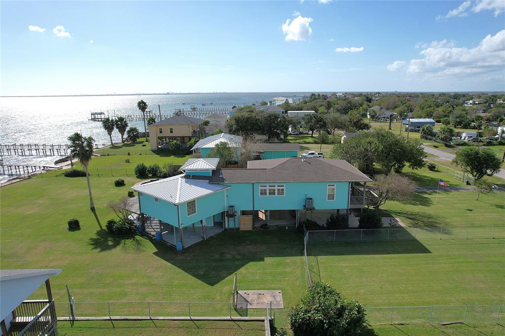 an aerial view of a house with a garden