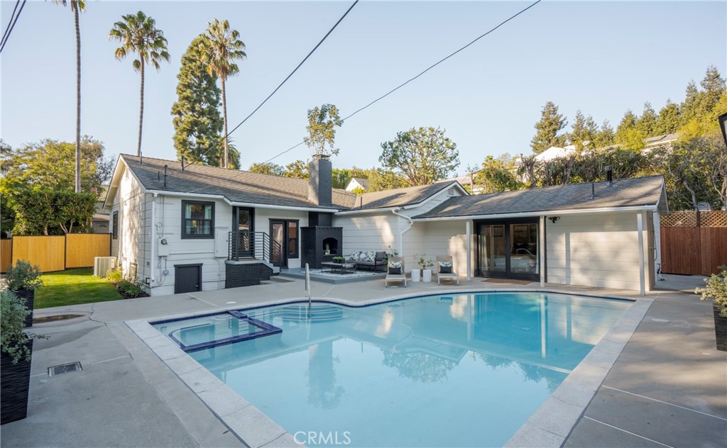 a view of a house with swimming pool