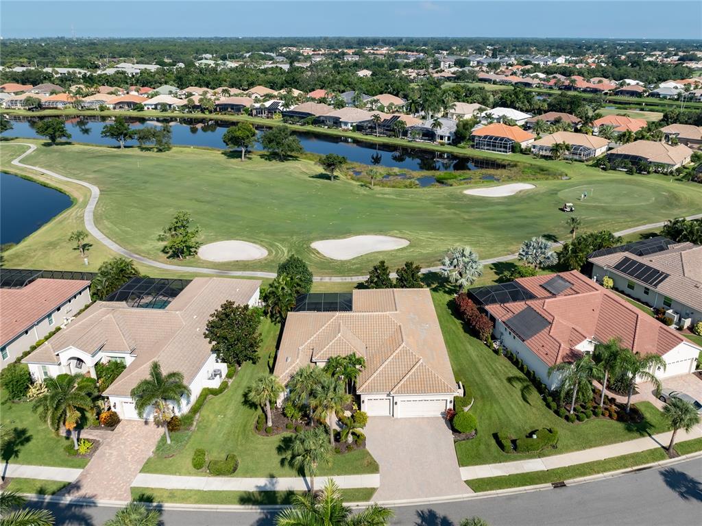 SWEEPING VIEWS OF 7TH FAIRWAY AND PONDS.