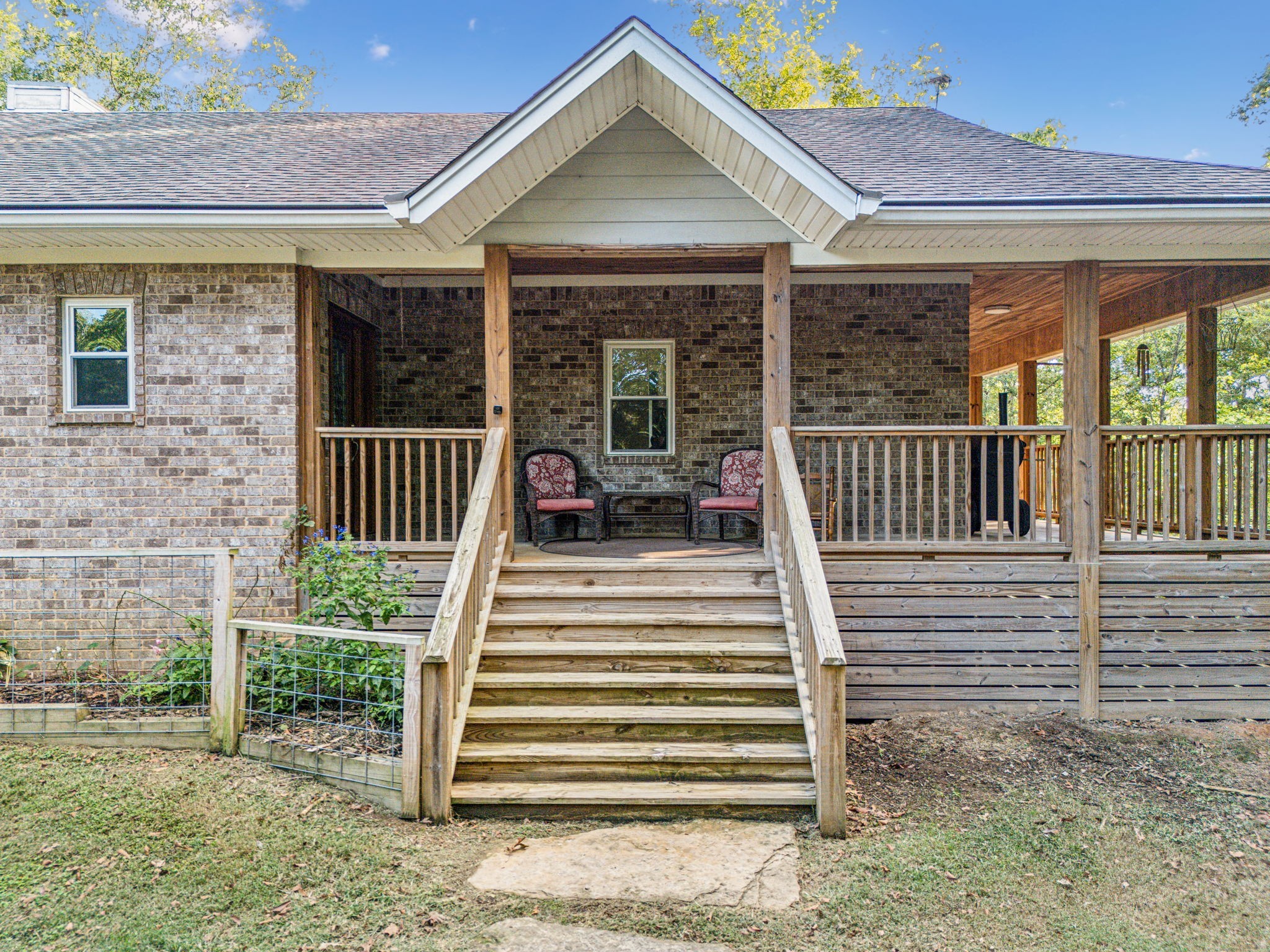 This front porch offers a beautiful secluded spot to sit and watch wildlife.  Spring, Summer, Fall, or Winter- the view from the front porch is amazing.