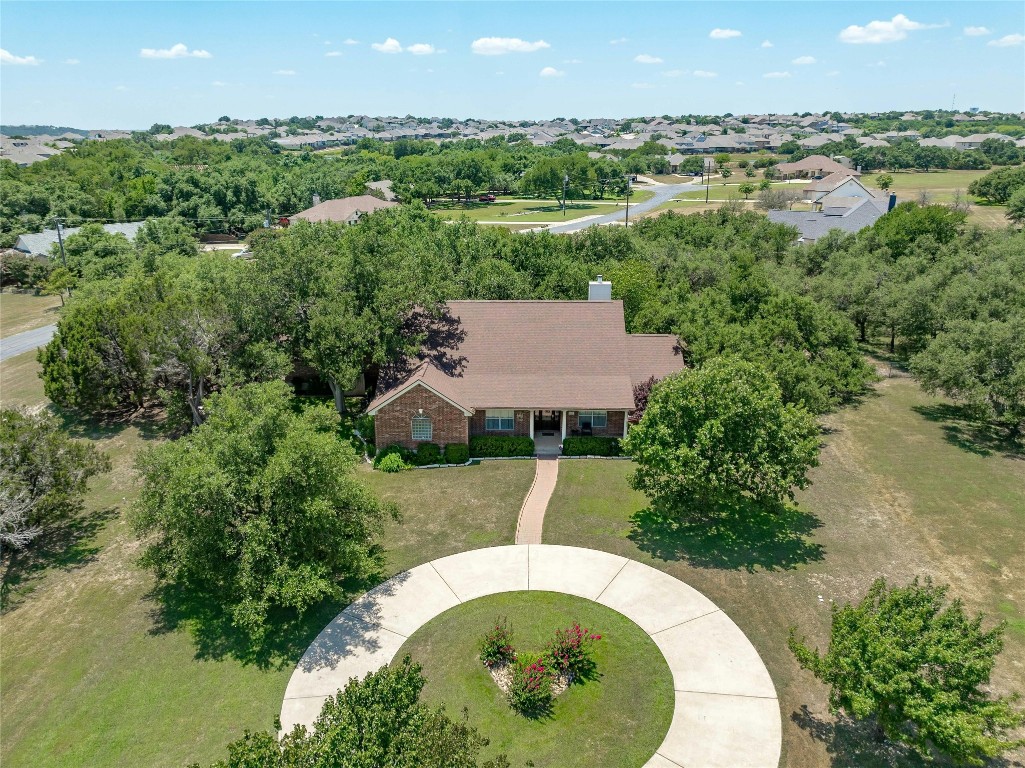 A circle drive guides guests to your covered front porch and front door.