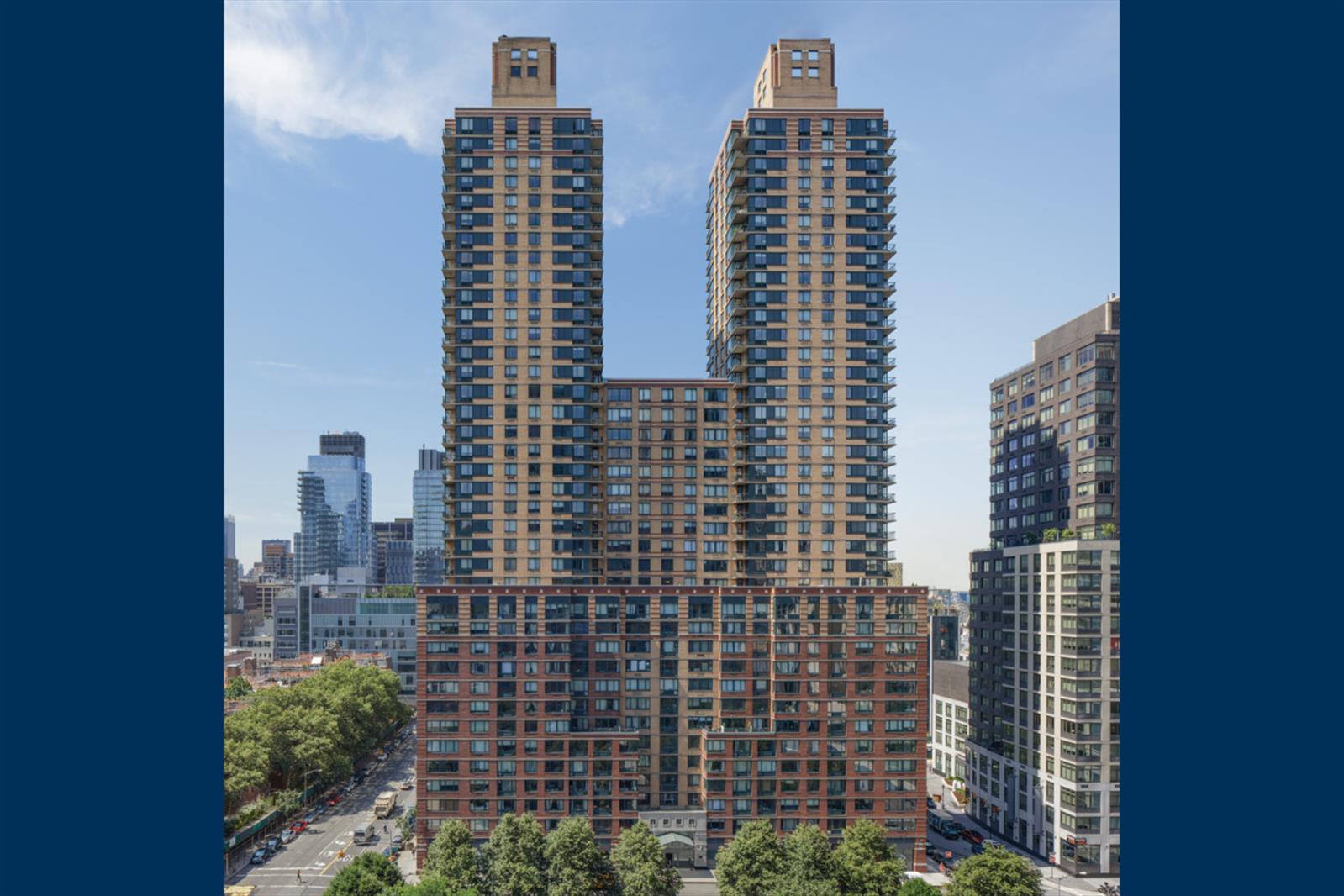 a view of a city with tall buildings