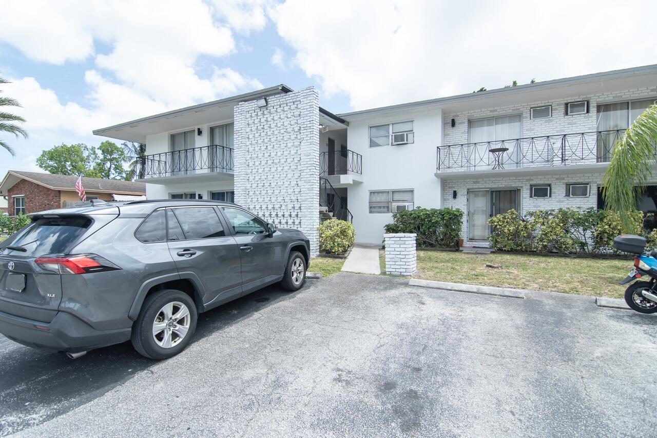 a car parked in front of a house