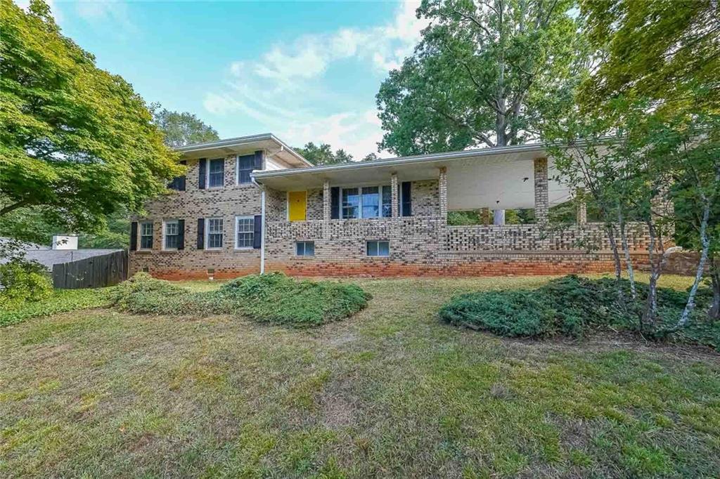 front view of a house with a yard