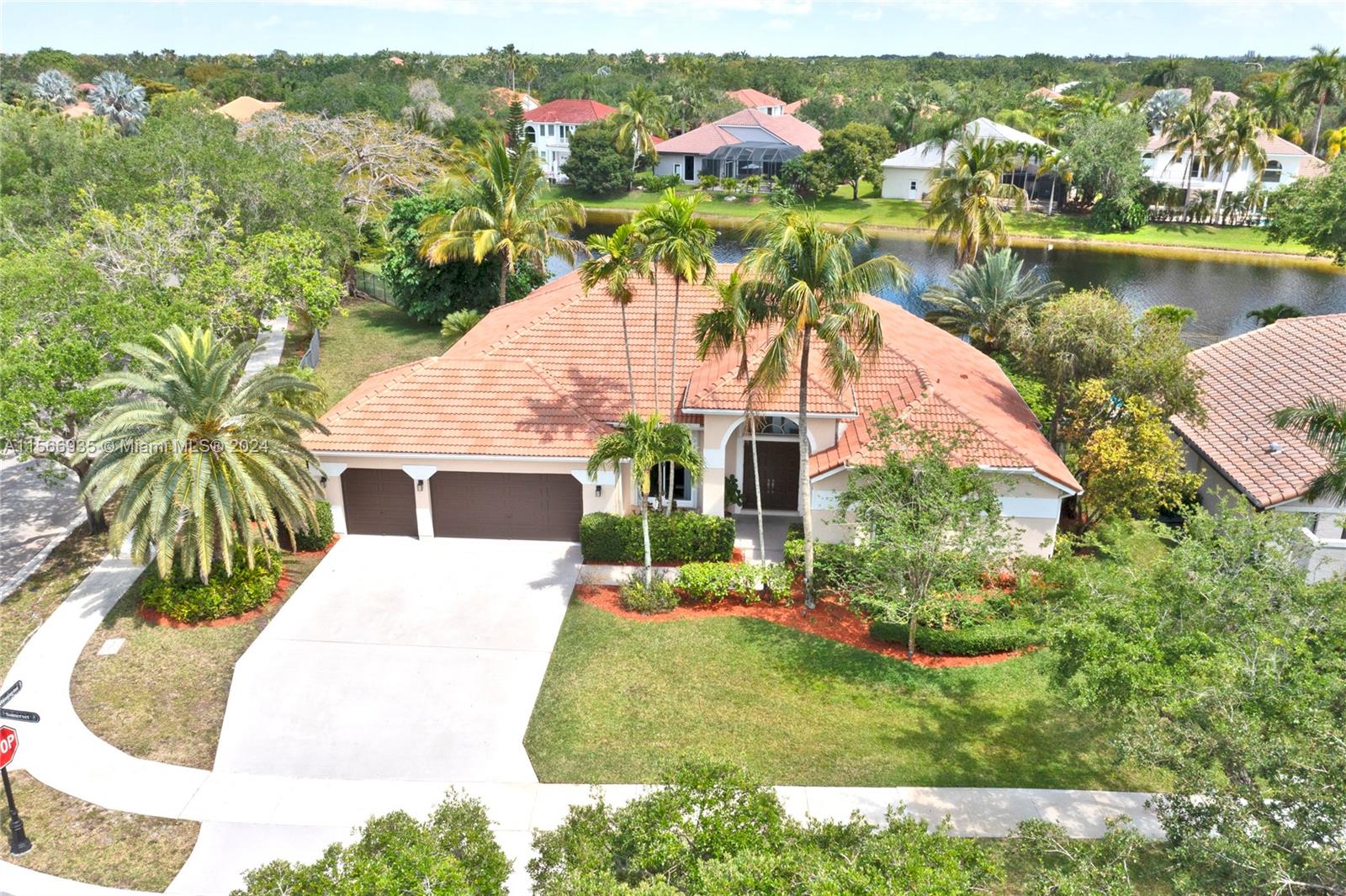 an aerial view of house with yard