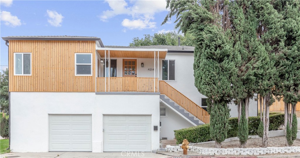 a house view with a outdoor space