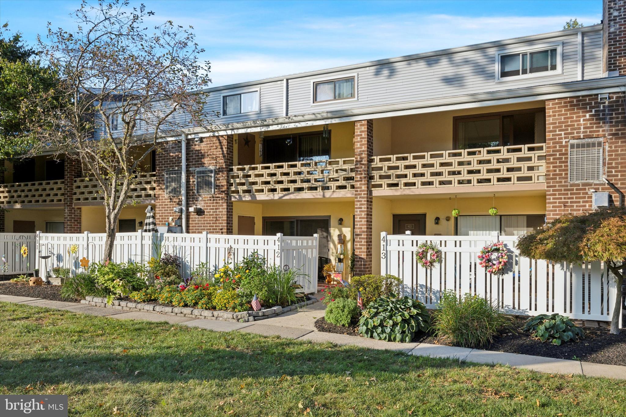 Lovely Front View with Perennial Garden