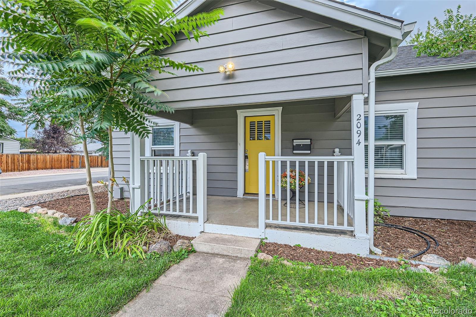 a front view of a house with a porch