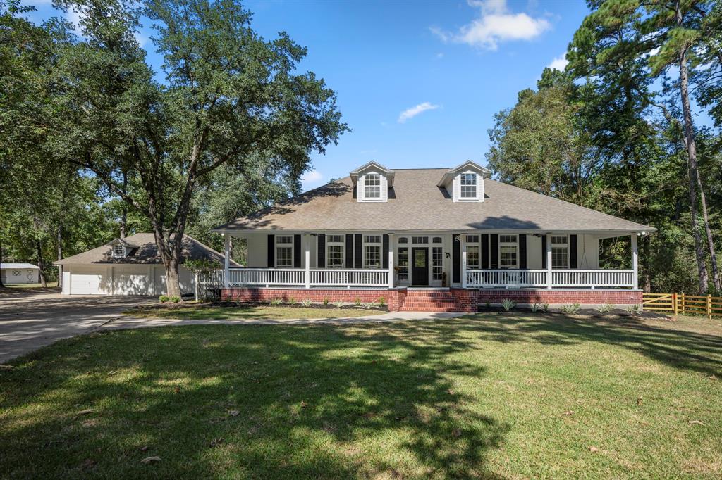 This home features an extra-large front porch, perfect for relaxing and enjoying the outdoors.