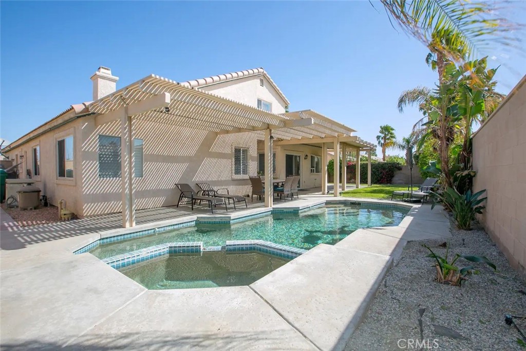 a view of a house with swimming pool