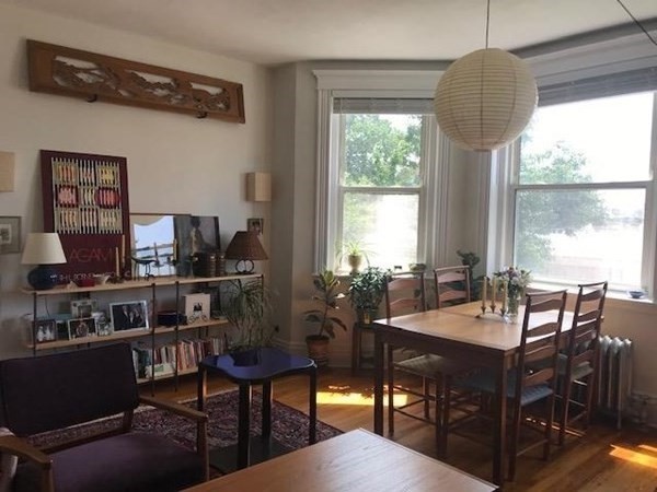 a view of a livingroom with furniture and window