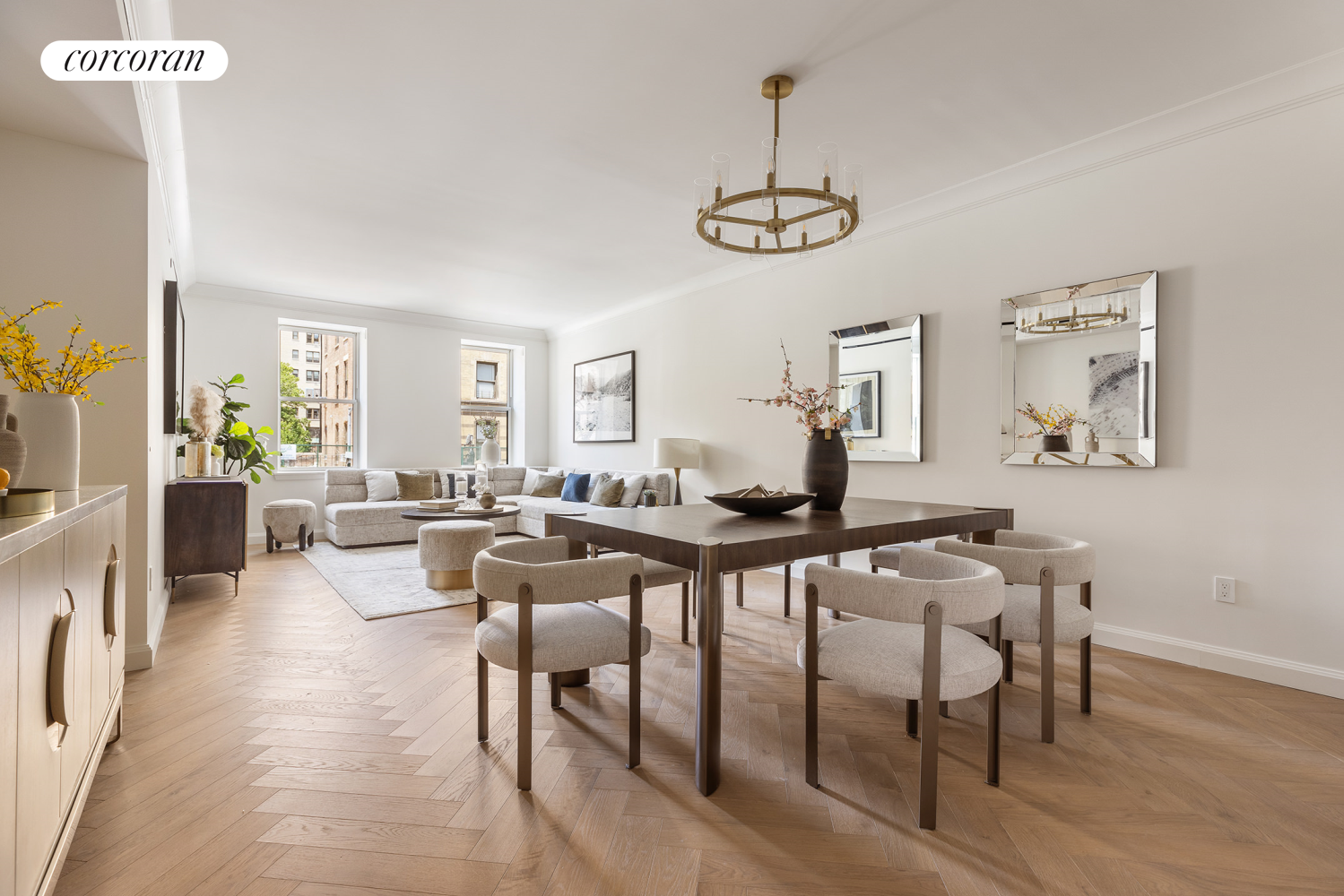 a view of a dining room with furniture window and wooden floor