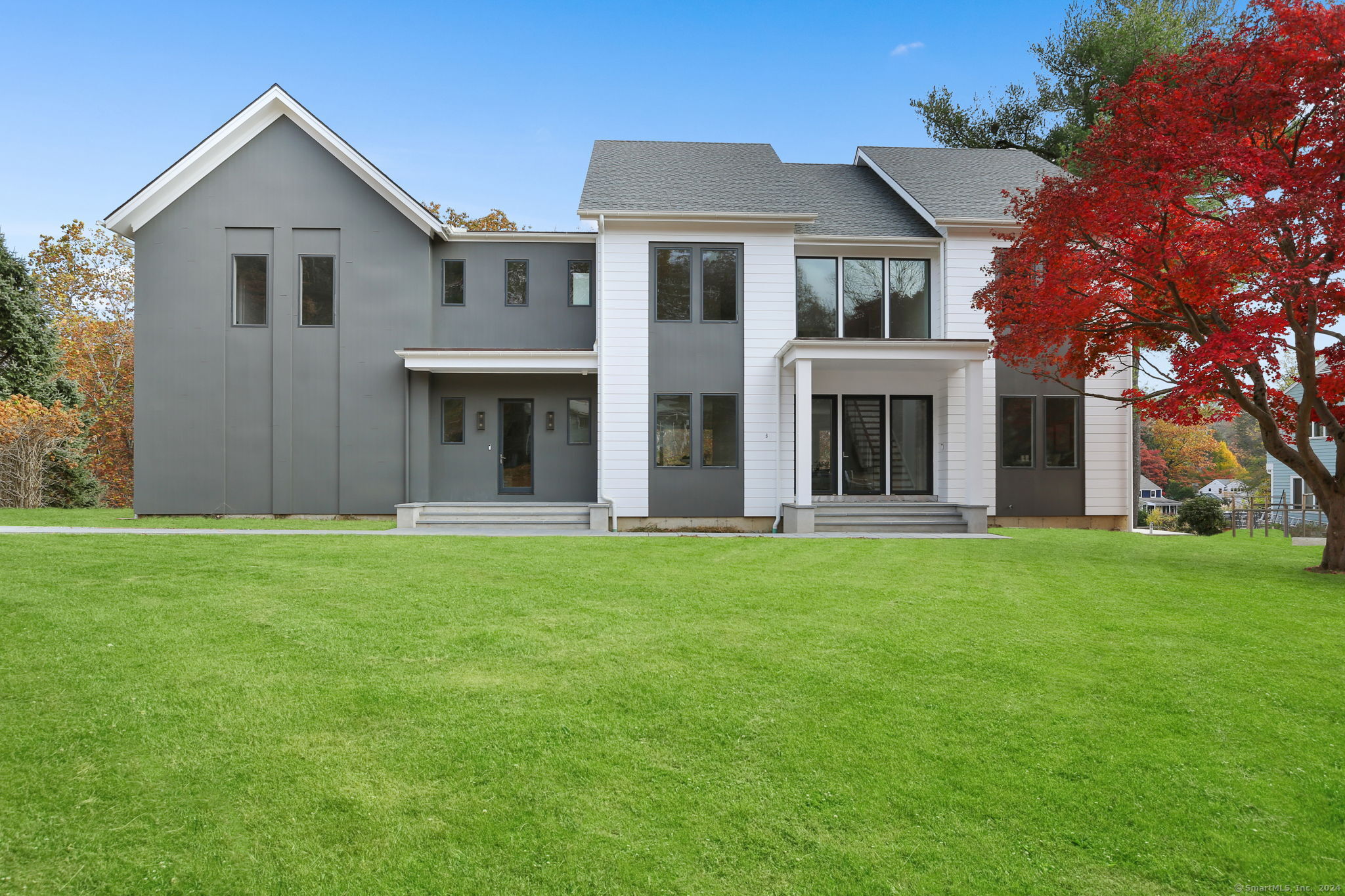 front view of a house with a yard