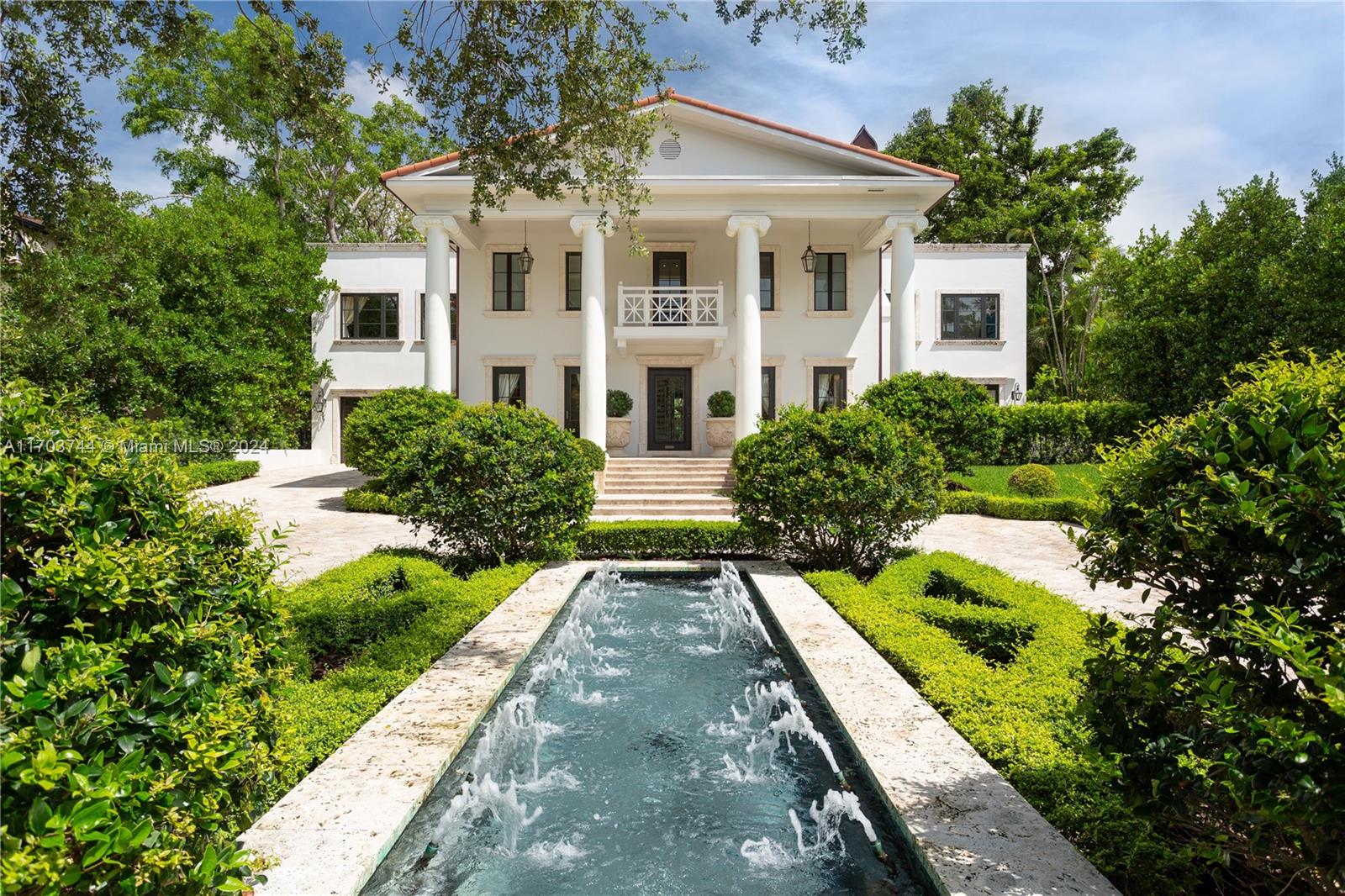 a view of house with yard