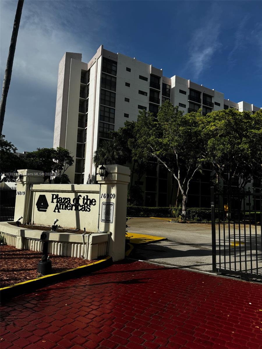 a view of building with sign board