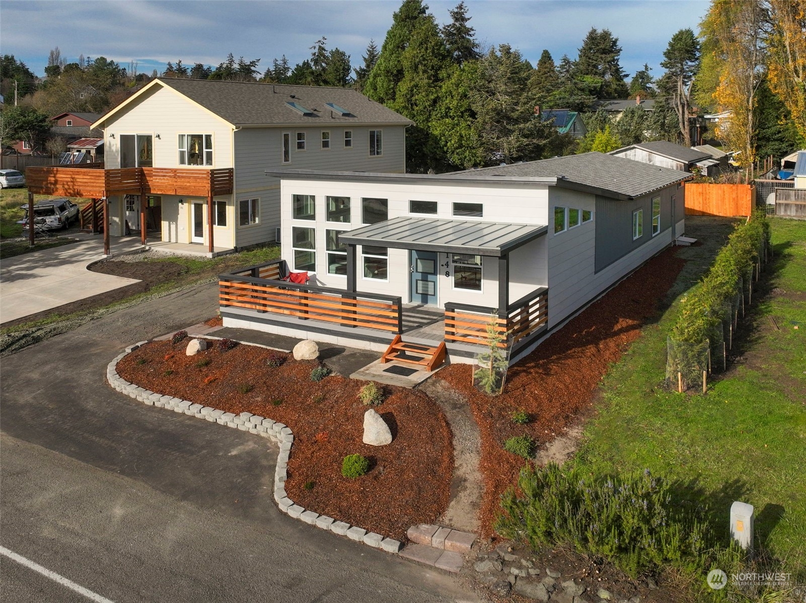 an aerial view of a house with swimming pool