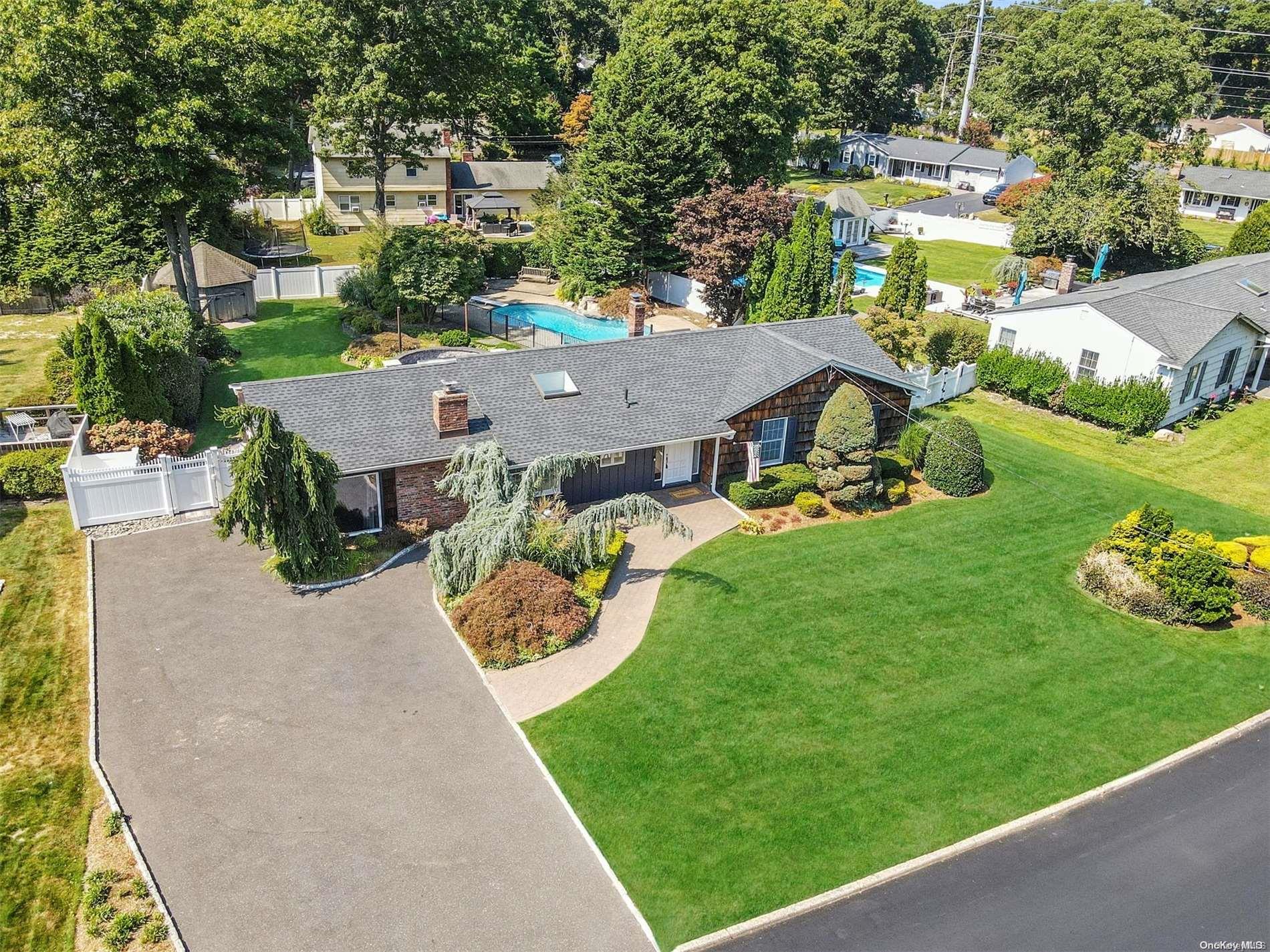 a view of a house with a big yard