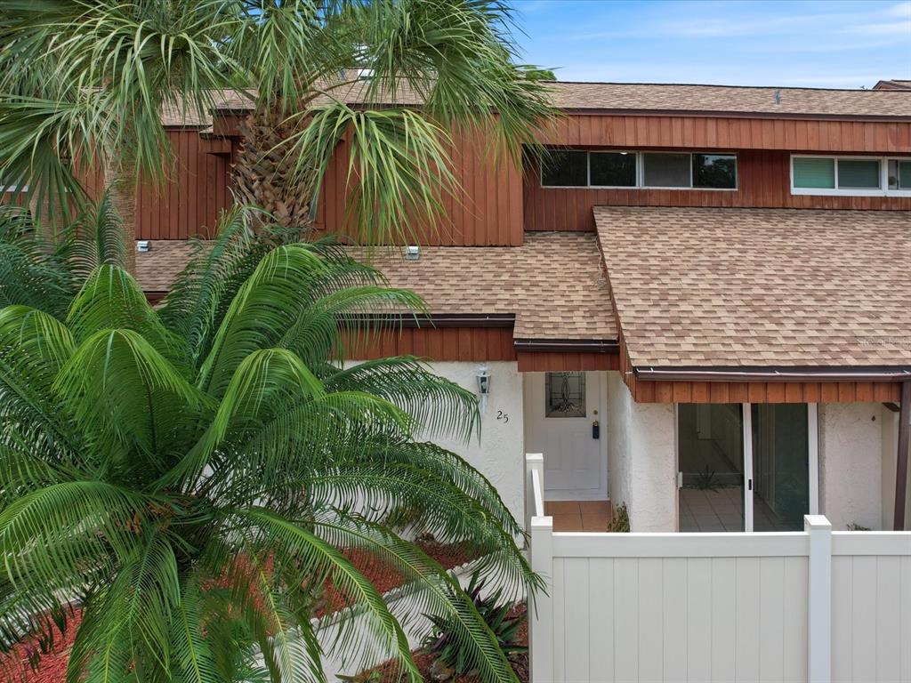 a view of front of house with a yard