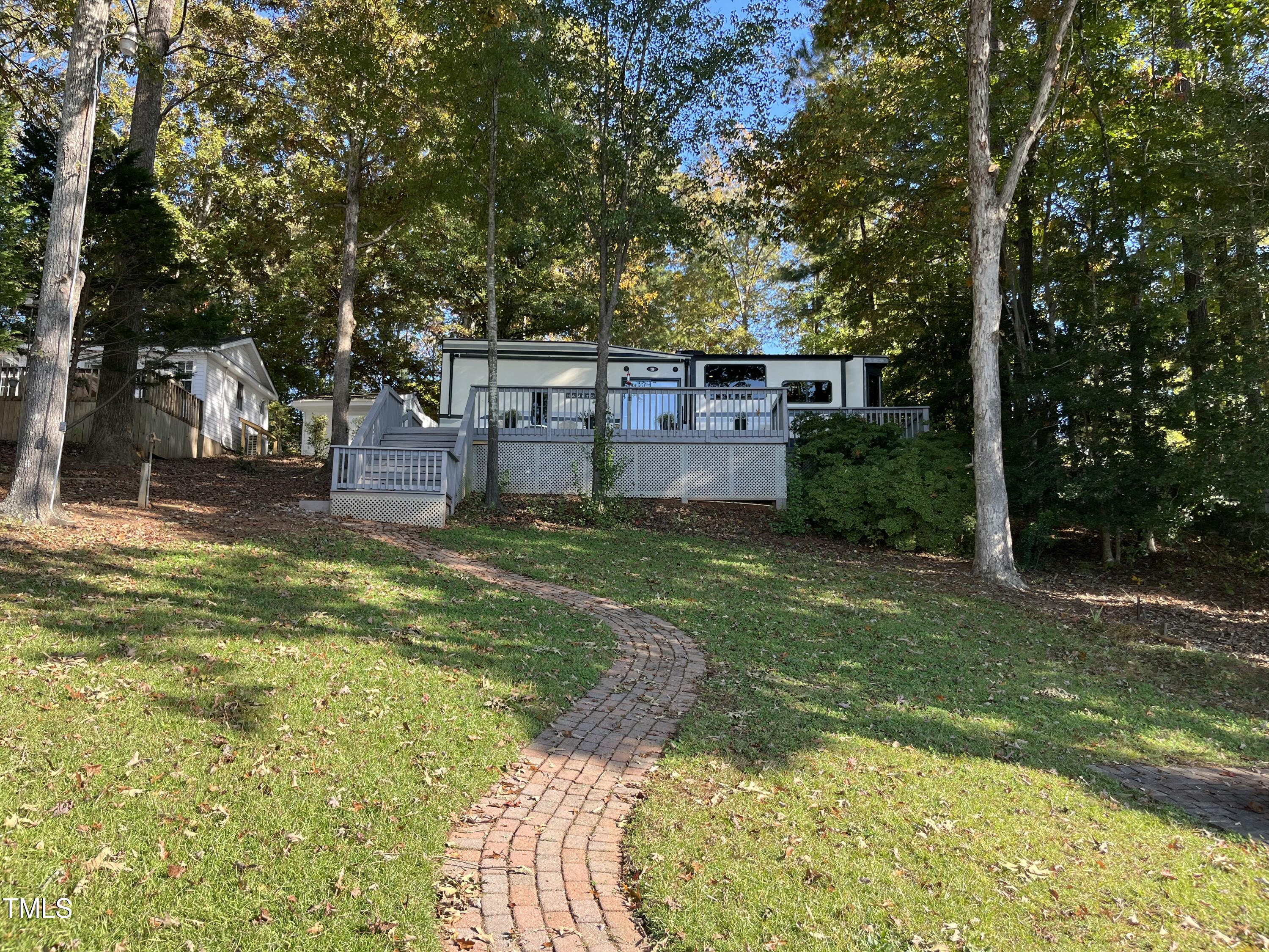 front view of a house with a big yard