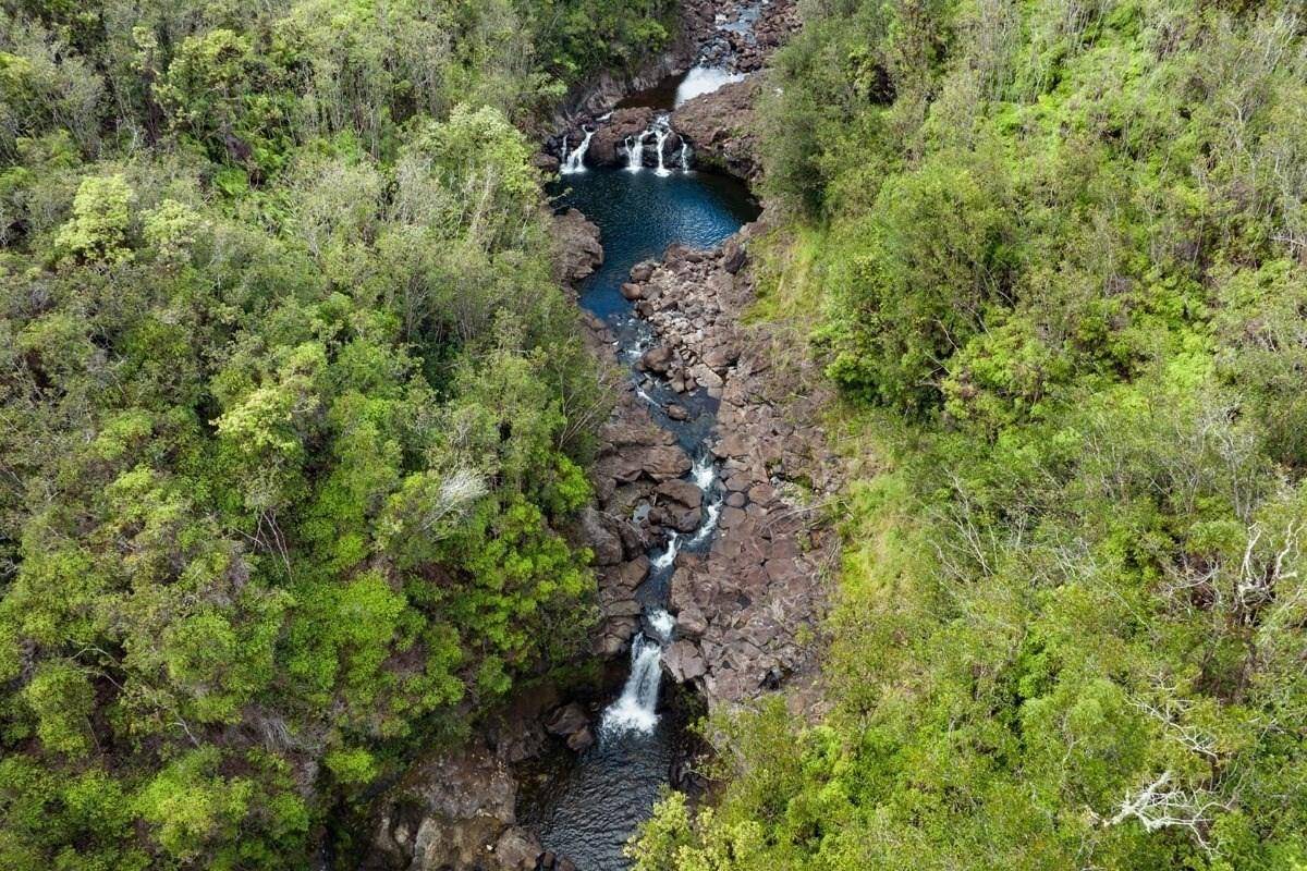 Kapue Stream comes onto the Subject Property for approximately half a mile and there you will find waterfalls and pools