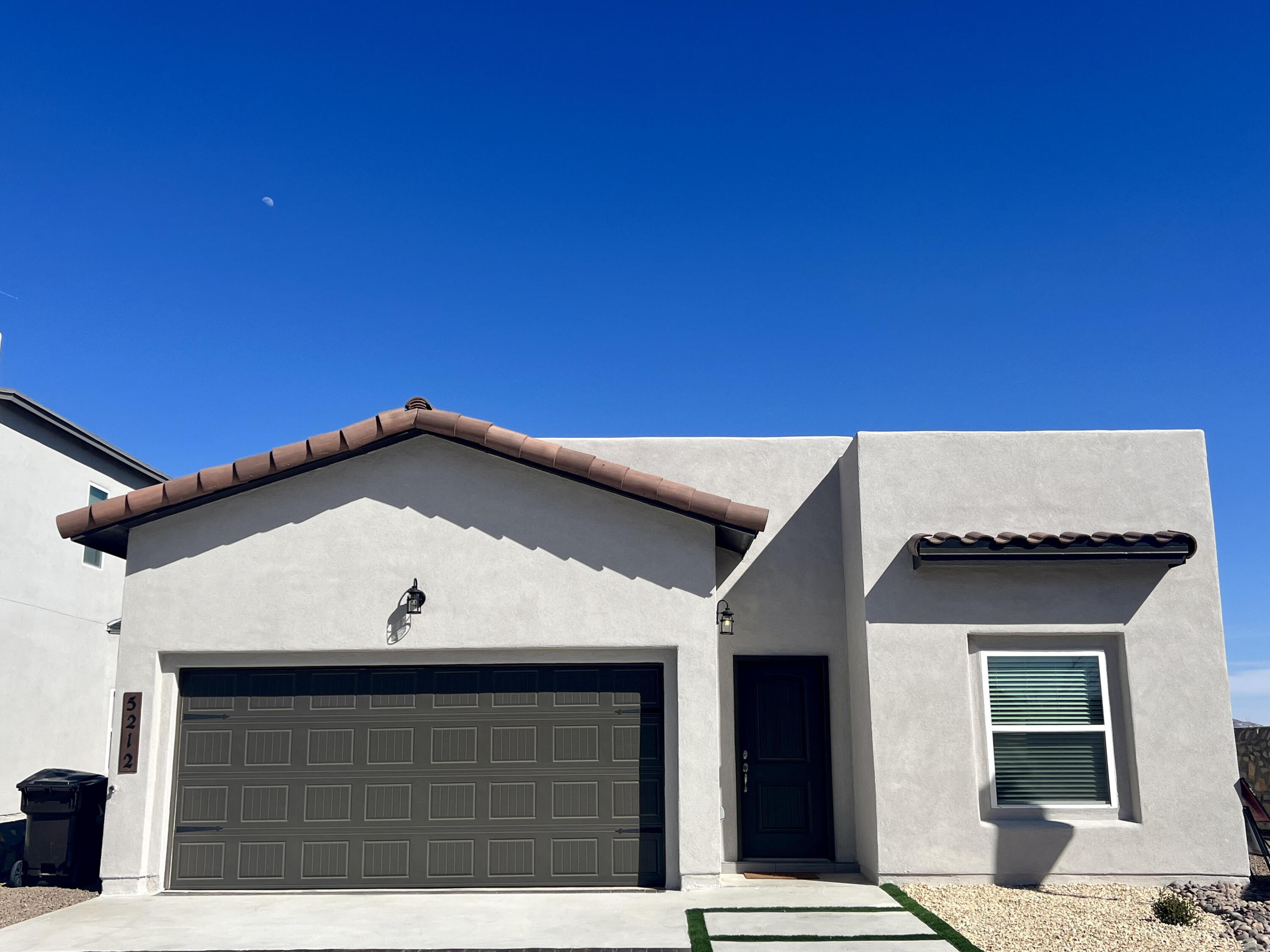 a view of a house with a garage