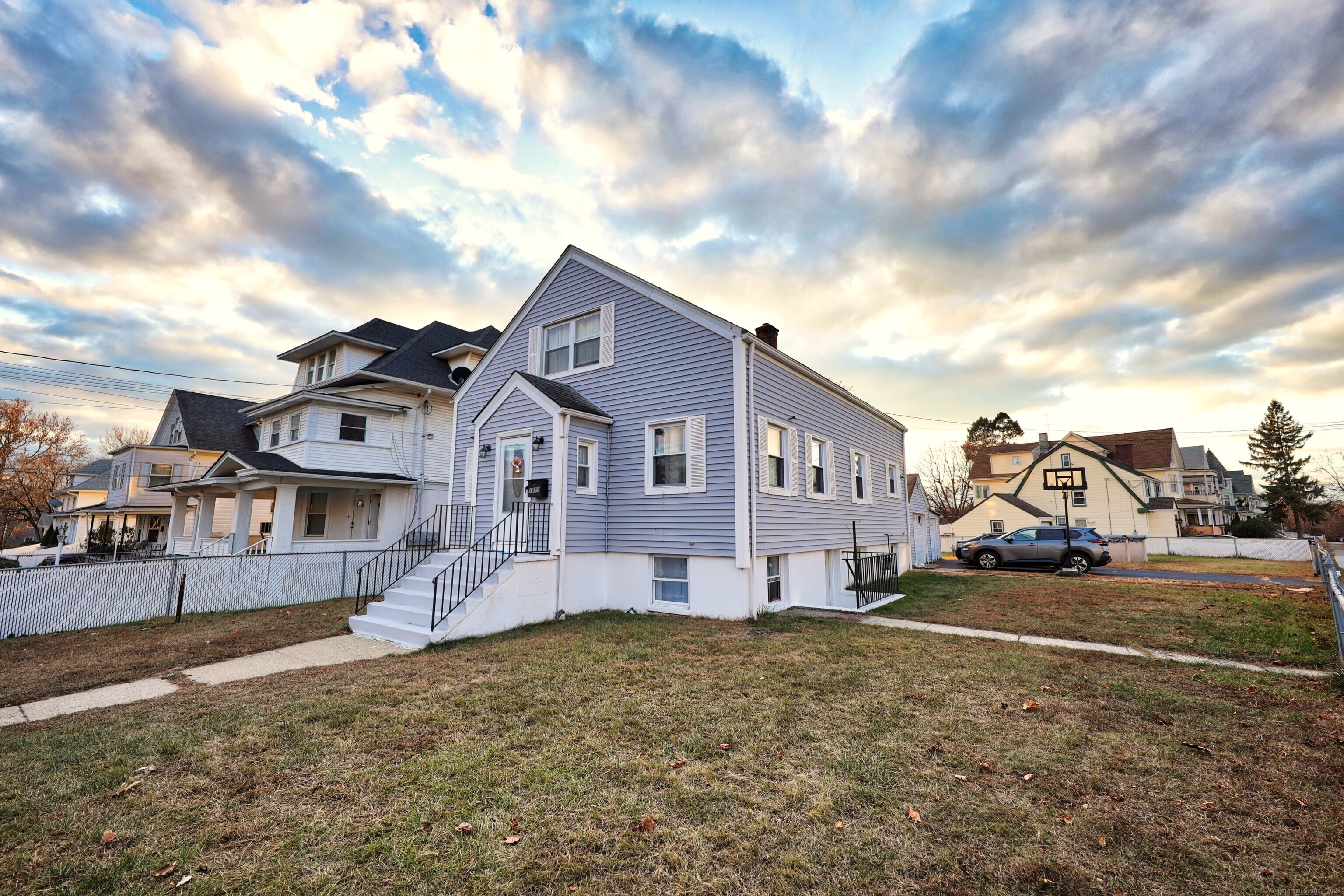 a view of a yard in front of a house